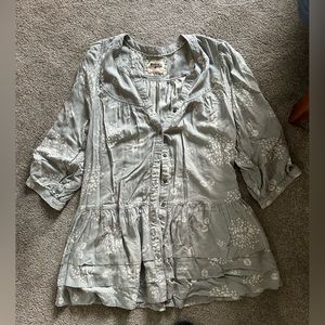 Holding horses long shirt!